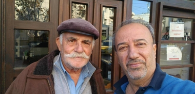 ‏ حارس اللويبدة يجلس على كرسيه منذ عشرات السنين لبيع اوراق اليانصيب  - صور