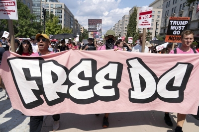 سكان واشنطن يحتجون ويطالبون بخروج الحرس الوطني من المدينة - صور