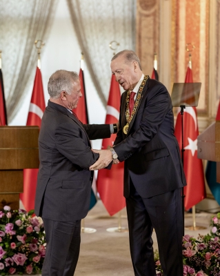 الملك وأردوغان يؤكدان ضرورة الحفاظ على سيادة الدول