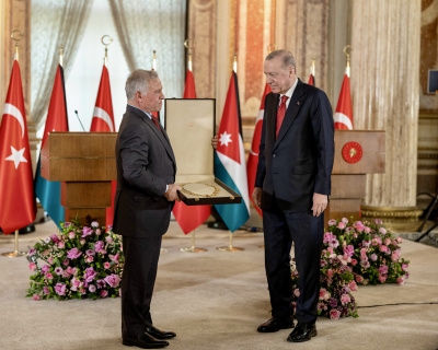 الملك وأردوغان يؤكدان ضرورة الحفاظ على سيادة الدول