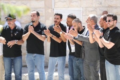 موظفو الأسواق الحرة يحتفلون بالاستقلال  - صور