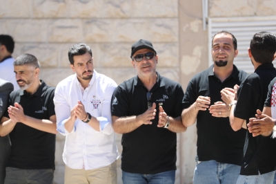 موظفو الأسواق الحرة يحتفلون بالاستقلال  - صور
