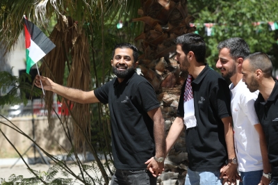 موظفو الأسواق الحرة يحتفلون بالاستقلال  - صور