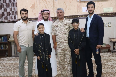 تهنئة بمناسبة إتمام حفظ القرآن الكريم للتوأمين عمر وعمرو سائد الخزاعلة