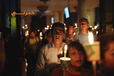 وقفة شموع وصلاة أمام كنيسة قلب يسوع الأقدس في تلاع العلي تضامنا مع شهداء حادثة الكرك