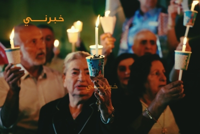 وقفة شموع وصلاة أمام كنيسة قلب يسوع الأقدس في تلاع العلي تضامنا مع شهداء حادثة الكرك