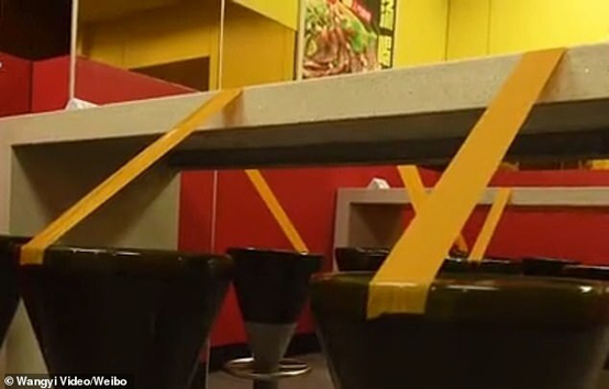 مطاعم الصين تحارب كورونا على طريقتها - صور