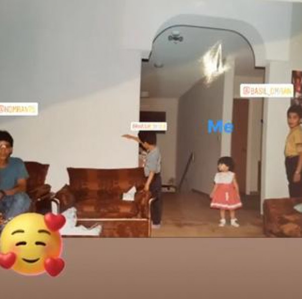 أسيل عمران تحارب الملل بصورة من طفولتها