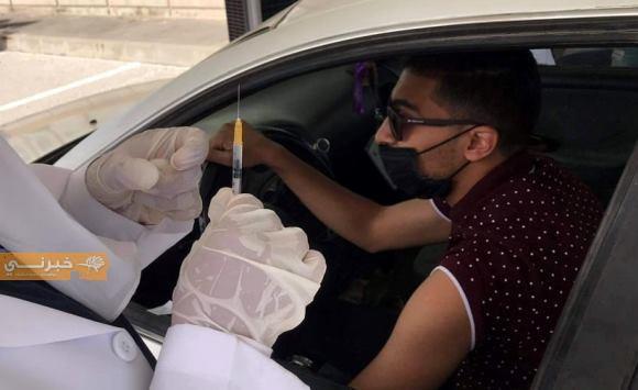 نقل مواعيد مراكز التطعيم من داخل السيارة 