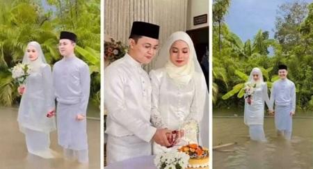 ماليزيا زفاف وسط الفيضان وإصرار على السعادة 