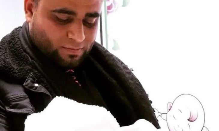 فلسطيني يطلق اسم أيهم كممجي على مولوده  صورة