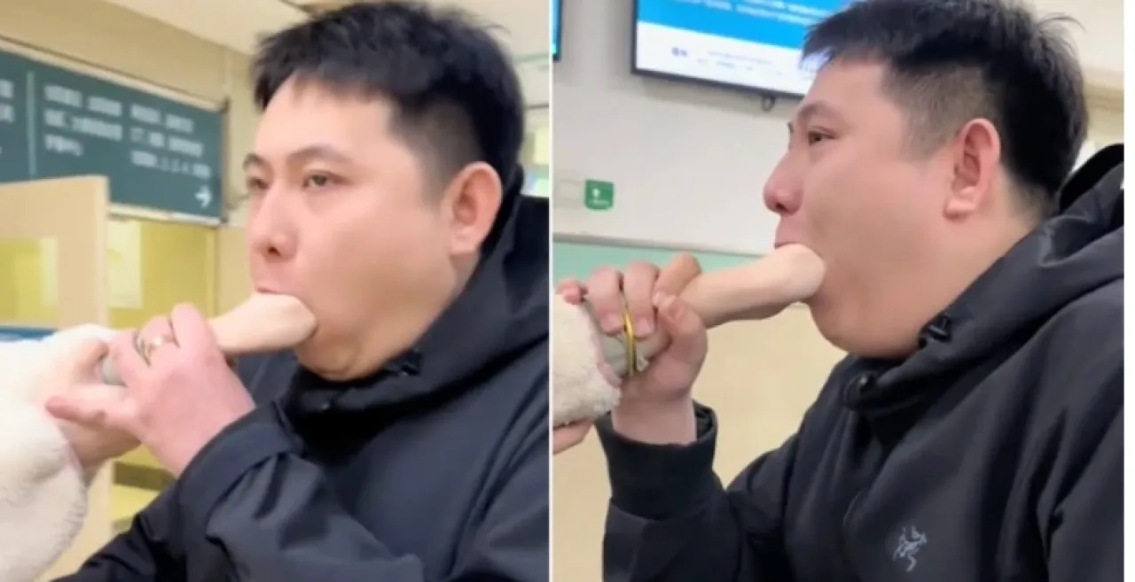 يد امرأة تعلق في فم رجل أثناء محاولتهما تصوير فيديو مضحك  فيديو