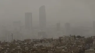 منظر جوي للعاصمة عمّان خلال تأثر الأردن بمنخفض خماسيني