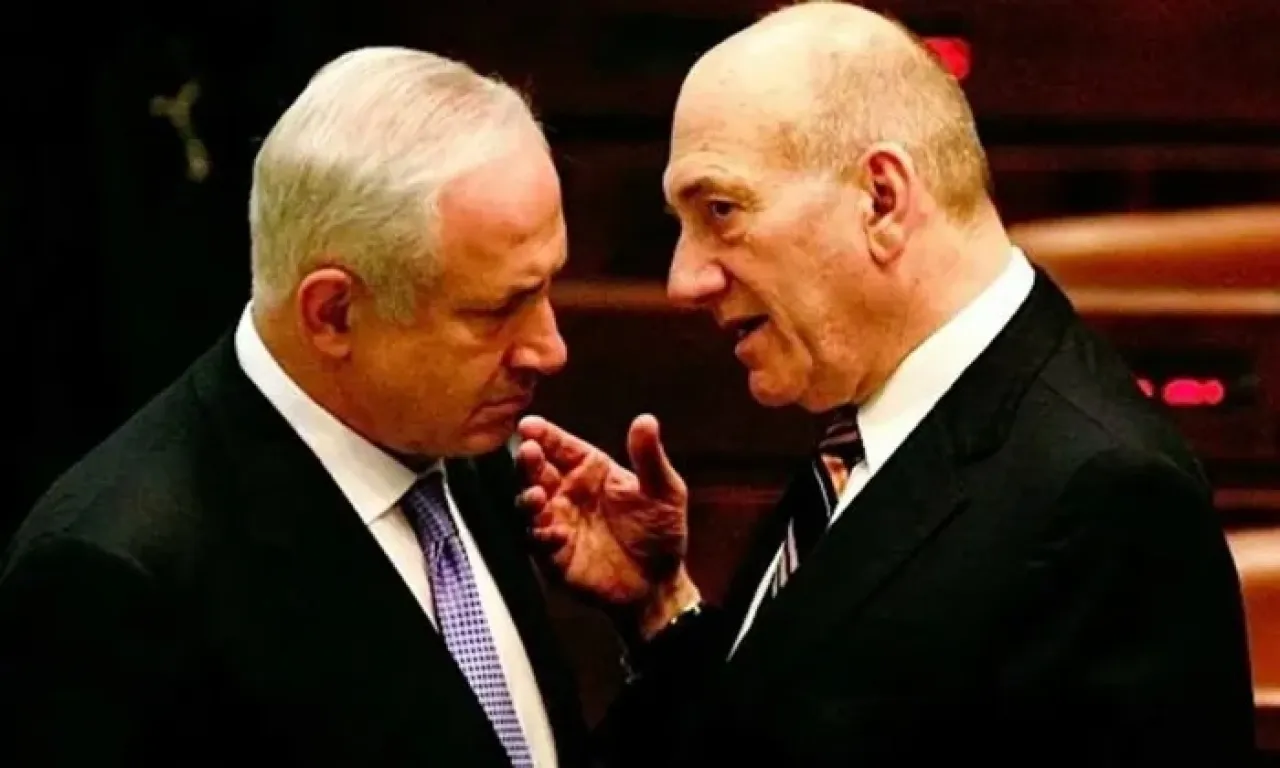 أولمرت نتنياهو نجح في صرف الانتباه عن الحرب المتعثرة بغزة