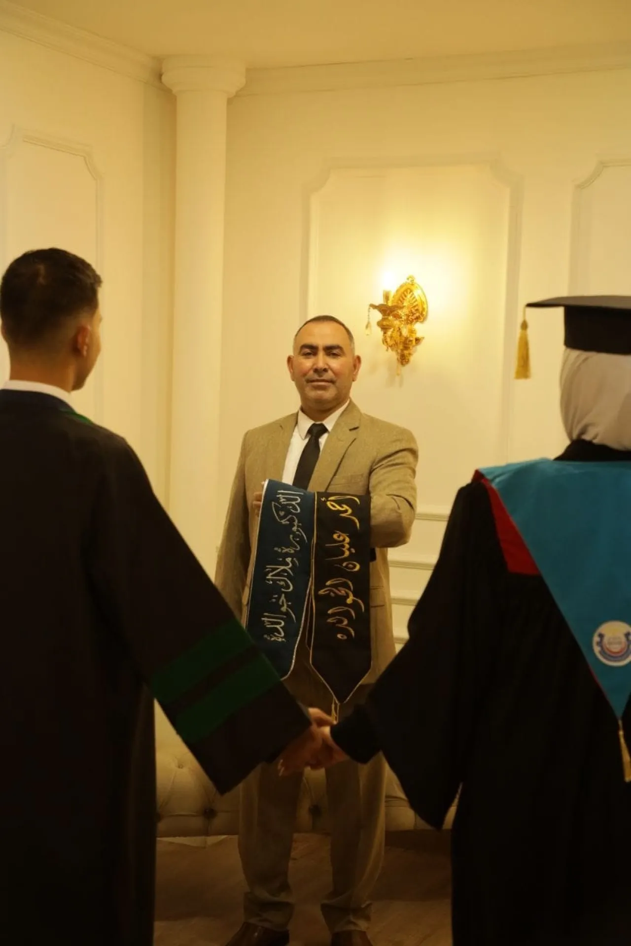 تهنئة بتخرج أحمد عليان والدكتورة ملاك عليان الخوالدة