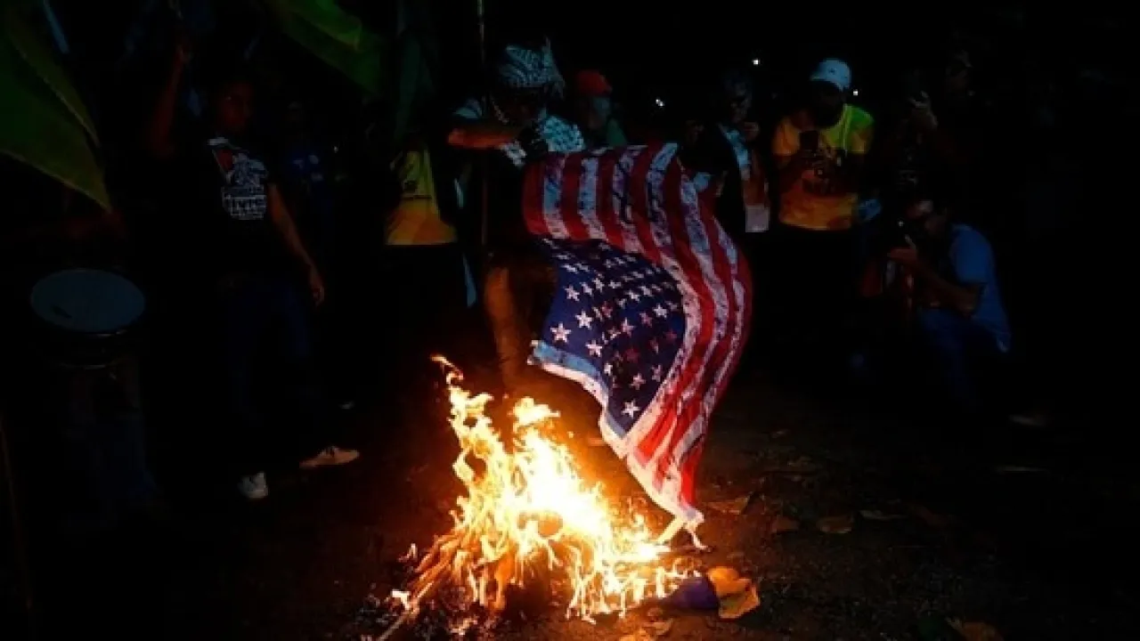 Trump From now on anyone who burns the American flag will be imprisoned