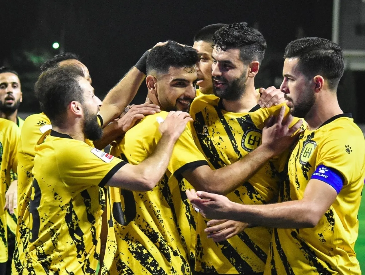 فرحة لاعبي الحسين  من اللقاء