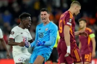 During Roma encounter .. Lille's French goalkeeper blocks a penalty taken 3 times