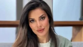 Nadine Nassib Njeim Falls to the Ground at a Global Event