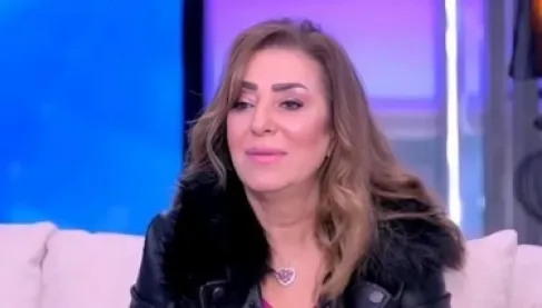 Lamia Al-Amir collapses during her brother Tareq's funeral