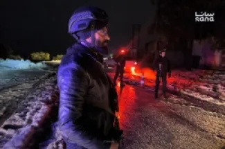 رجل امن يعمل على تأمين احتفالات رأس السنة في  ريف إدلب الغربي