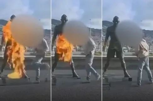 بالفيديو .. شاب برتغالي يحرق تمثال رونالدو في ماديرا