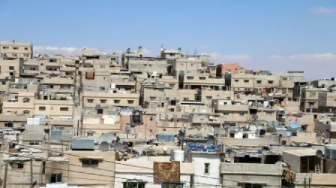 الموافقة على الحلول المتعلقة بالأراضي المقام عليها مخيمات والعائدة ملكيتها لمواطنين