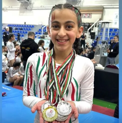 زين العضايلة تحصد الذهبية في بطولة الأردن للجمباز