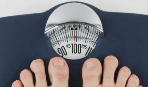 How does a fasting person maintain their weight amid the (trap of Iftar feasts)?