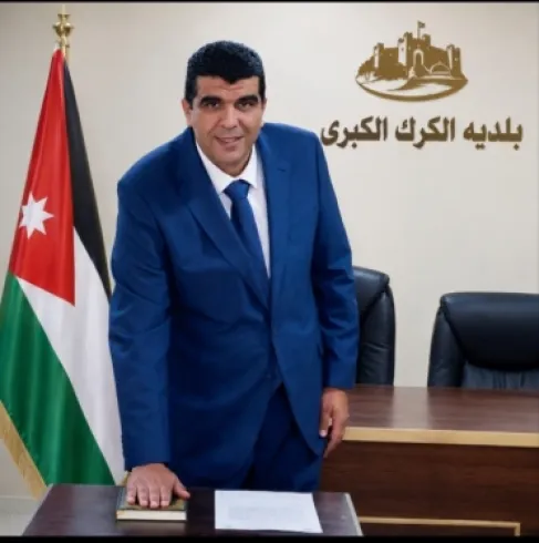 العمرو يهنىء الحباشنة بعضوية ك بلدية الكرك