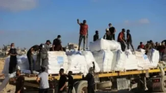 من توزيع المساعدات في قطاع غزة
