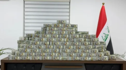 العراق يضبط 20 مليون دولار ويسترد 60 كيلوغراما من الذهب في قضية فساد
