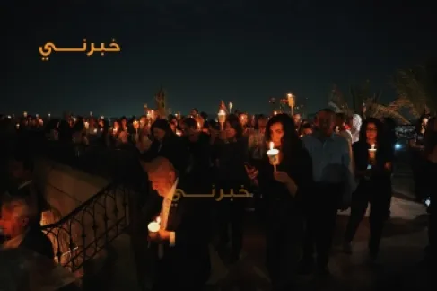 وقفة شموع وصلاة أمام كنيسة قلب يسوع الأقدس في تلاع العلي تضامنا مع شهداء حادثة الكرك